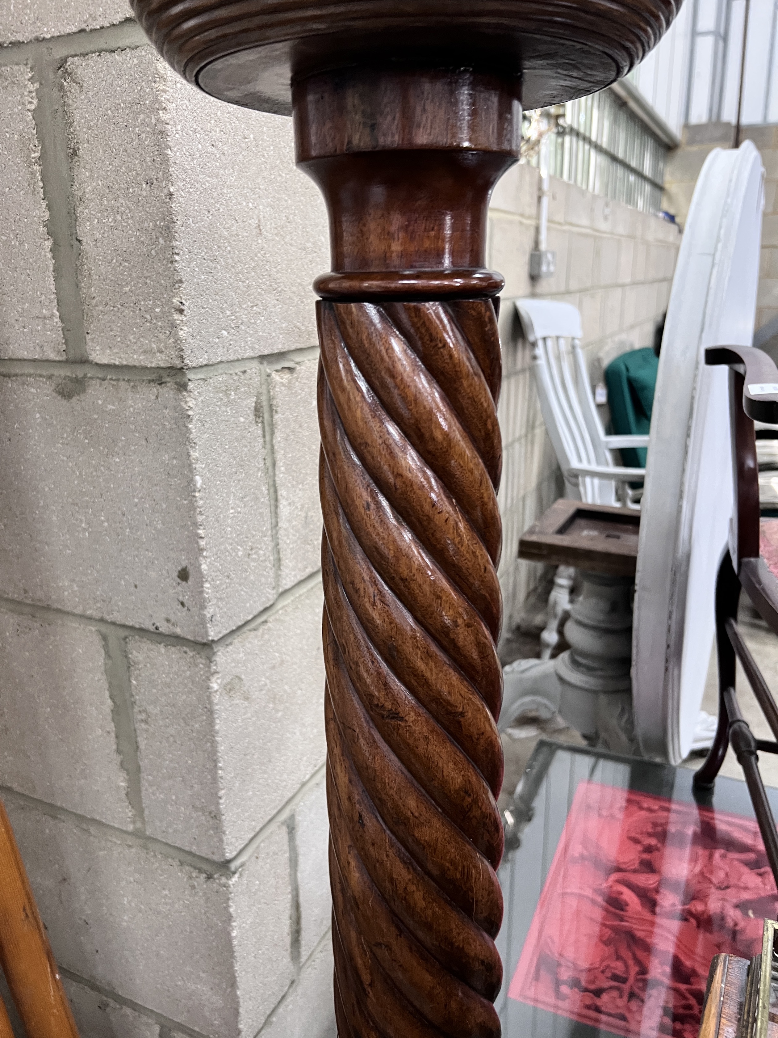 A Victorian style mahogany torchere, height 135cm